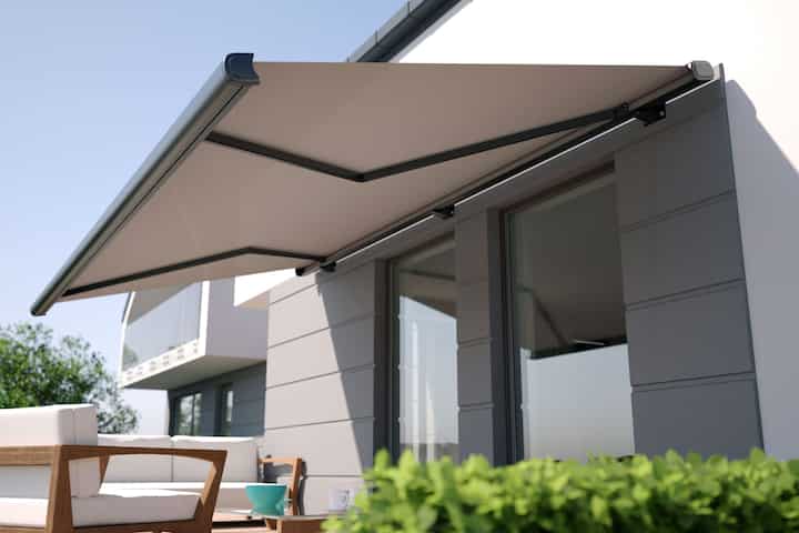 Beautiful residential awning enhances Anchorage, AK residence.